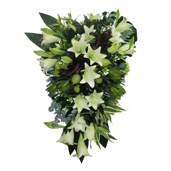 Rouwarrangement langwerpig met witte Lelies Rouwarrangement langwerpig met witte Lelies