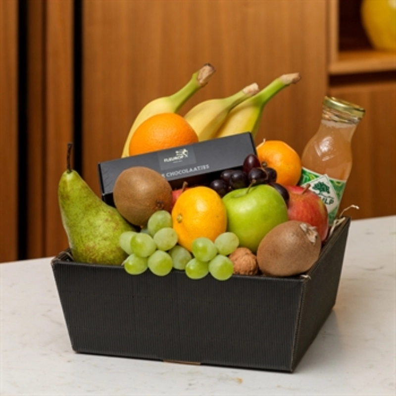 Luxe fruitmand met chocolade en sap